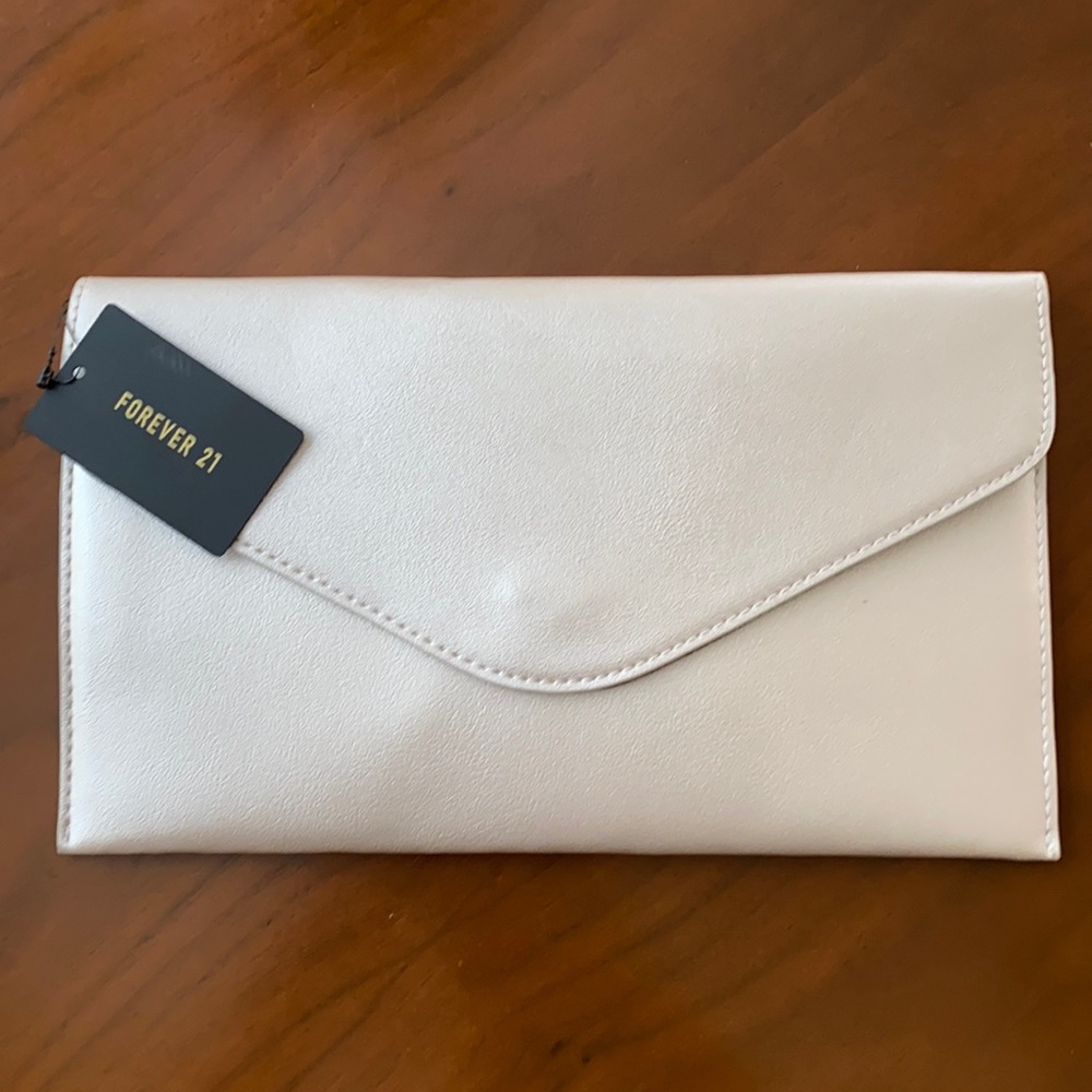 Light pink clutch. Never worn